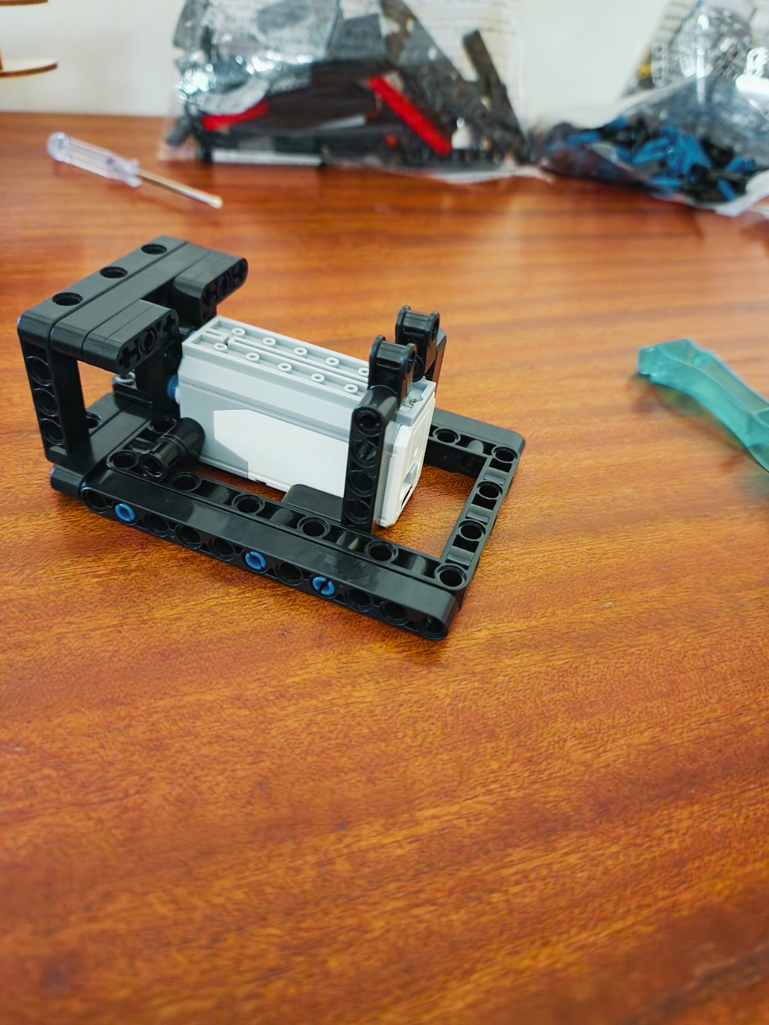 Close-up of radial engine model kit display base and motor housing during assembly